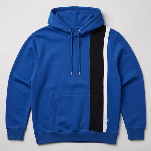 A cobalt blue hoodie with a color-blocked panel, laid flat for sample review.