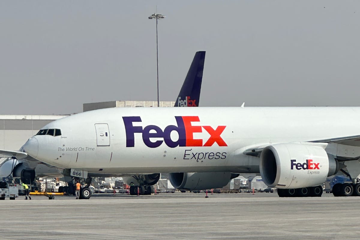 A FedEx Express cargo plane on the tarmac.
